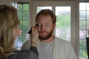 the star (Neil O'Shea) having make up applied